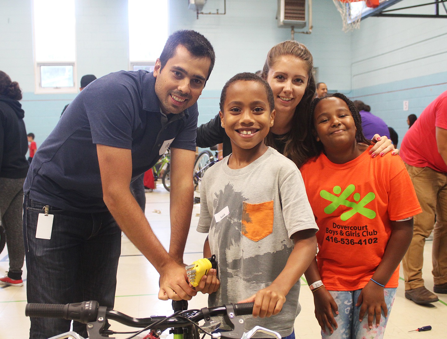 Two employee volunteers with two Club youth